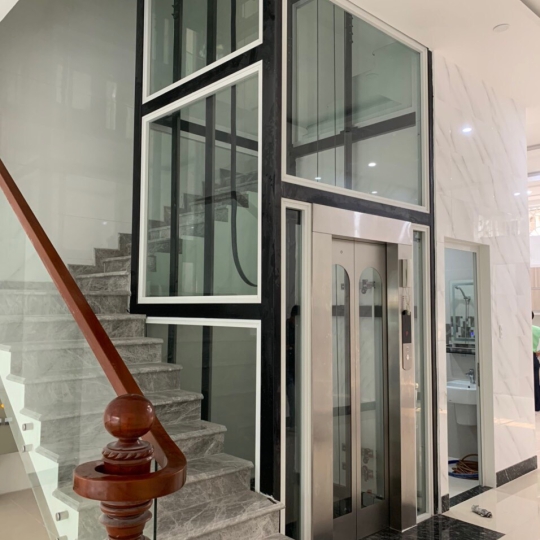 THANG MÁY GIA ĐÌNH THIẾT KẾ LỒNG KÍNH