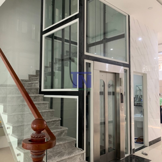 THANG MÁY GIA ĐÌNH THIẾT KẾ LỒNG KÍNH